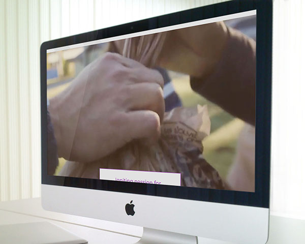 Cropped image from a community foundation's website, shown on an iMac