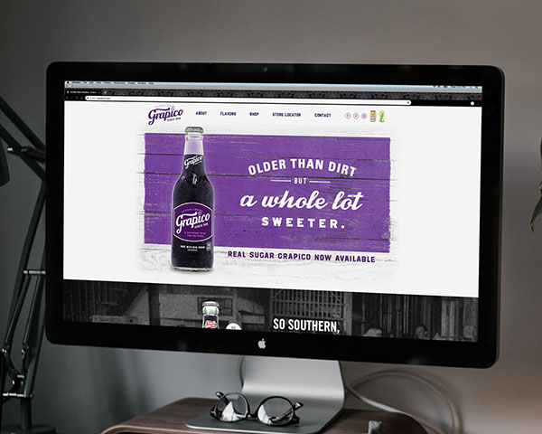 A screenshot from the Grapico 100th anniversary microsite on an iMac