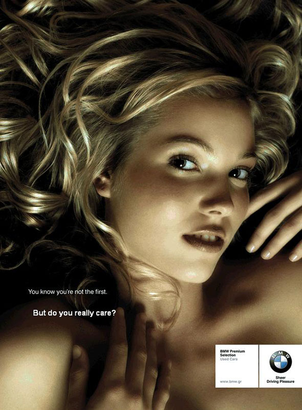 A 2008 BMW print ad. It’s… wrong. Without getting too uncomfortable: The ad shows a young blonde woman — seriously, she looks like a teenager — apparently without clothes on, lying back with her hair tumbling around her, touching her own face and gazing at the camera. The ad copy says, “You know you’re not the first. But do you really care?” In the lower right corner is the BMW logo next to “BMW Premium Selection Used Cars.” Now please put this imagery out of your mind.