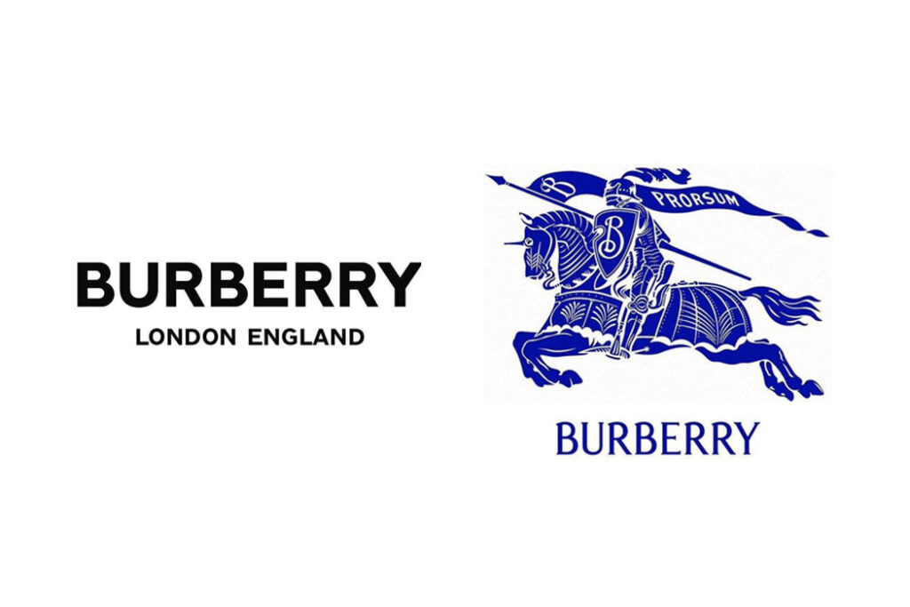 Burberry logos, side by side. On the left is the word “Burberry” in a black sans-serif font, all caps, with the words “London England” in smaller letters centered underneath. On the right, in dark blue, is a drawing of a knight on a horse, charging, holding a shield with a script letter “B” on it and a banner above him that says, “Prorsum.” Underneath is the word “Burberry” in all caps in an old-looking serf font.
