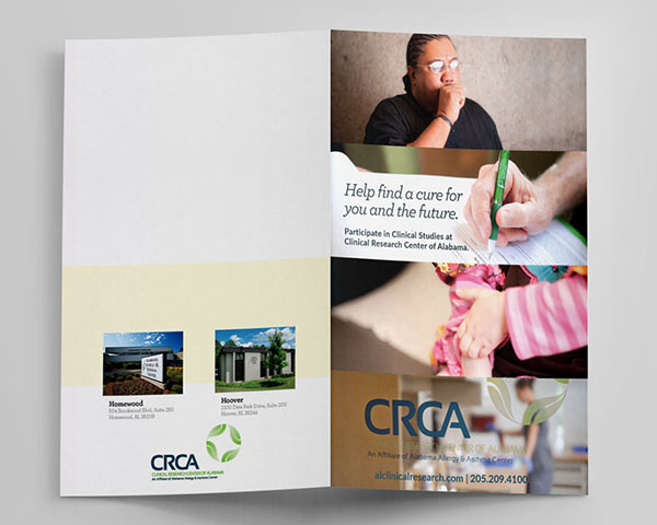 The CRCA brochure, open and face-down on a gray surface